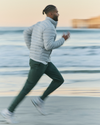 man wearing vuori running